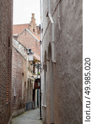 street in Bruges, Belgium. Bruges is the capital and largest city of the province of West Flanders in the Flemish Region of Belgium.. street in Bruges, Belgium. Стоковое фото, агентство Ingram Publishing / Фотобанк Лори
