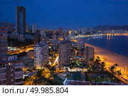 Benidorm beaches and skyscrapers at night, known throughout Europe as Spanish major tourist destination with thousands of visitors a year.. View of Benidorm at night. Стоковое фото, агентство Ingram Publishing / Фотобанк Лори