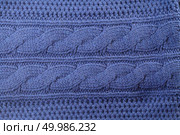 Blue knitted sweater texture background. Space for cop. knitted sweater texture background. Стоковое фото, агентство Ingram Publishing / Фотобанк Лори