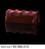 Delicious chocolate candy on a black background. chocolate candy on black background. Стоковое фото, агентство Ingram Publishing / Фотобанк Лори