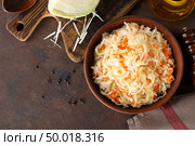 Sauerkraut. Chopped cabbage pickled in brine. Стоковое фото, агентство Ingram Publishing / Фотобанк Лори