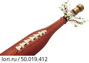 Football celebration bottle with splash and flying cork explosion as a symbol of winning and championship win sport party happiness with 3D illustration elements isolated on a white background. Стоковое фото, агентство Ingram Publishing / Фотобанк Лори