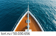 View of the sea from above and the bow of the ship. Generated by AI. Стоковое AI-изображение, AI-художник Анна Никонорова / Фотобанк Лори