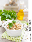 Barley porridge on white background. Стоковое фото, агентство Ingram Publishing / Фотобанк Лори