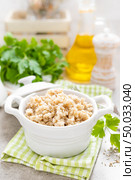 Barley porridge on white background. Стоковое фото, агентство Ingram Publishing / Фотобанк Лори