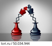Business leadership competition as opponent enemies in a battle as a strategy concept with two chess king figures fighting as a 3D illustratiomn. Стоковое фото, агентство Ingram Publishing / Фотобанк Лори