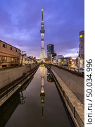 Tokyo skytree sunset in japan. Tokyo Skytree is the highest free-standing structure in Japan and 2nd in the world with over 10million visitors each year. Стоковое фото, агентство Ingram Publishing / Фотобанк Лори