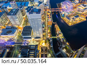 Aerial view of panoramic modern city in Yokohama City Japan with blue hour after sunset in th evening. Yokohama is the second largest city in Japan by population. Стоковое фото, агентство Ingram Publishing / Фотобанк Лори