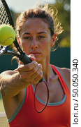 A slow-motion capture of a tennis player's racket striking the ball, the strings bending under impact, sweat flying off their face. Стоковое AI-видео, аниматор Sergey Grishin / Фотобанк Лори