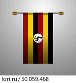 Uganda hanging Flag. Стоковая иллюстрация, агентство Ingram Publishing / Фотобанк Лори