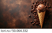 Captivating chocolate ice cream waffle cone on textured brown surface with coffee beans. Стоковое AI-изображение, AI-художник Андрей Бакусов / Фотобанк Лори