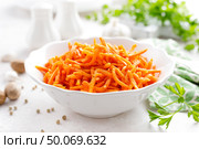 Salad with fresh raw carrot, Korean carrot salad. Стоковое фото, агентство Ingram Publishing / Фотобанк Лори