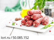 Raw lula kebab on skewers. Стоковое фото, агентство Ingram Publishing / Фотобанк Лори