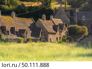 Bibury village in Cotswolds England UK. Стоковое фото, агентство Ingram Publishing / Фотобанк Лори