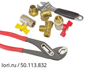 Разводной ключ, краны и фитинги на белом фоне. Diverter wrench, faucets and fittings on white background. Стоковое фото, фотограф Татьяна Д / Фотобанк Лори