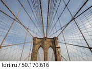 Architecture of Brooklyn bridge over east river in Brooklyn New York city NYC USA. Стоковое фото, агентство Ingram Publishing / Фотобанк Лори
