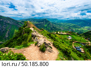Picturesque mountain landscape with a photofacility tower of the Russian fortress in Gunib. Dagestan, Caucasus (2024 год). Стоковое фото, фотограф Константин Лабунский / Фотобанк Лори