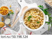 Makaroni po-flotski. Boiled pasta in navy-style with ground chicken meat and fried onions. Стоковое фото, агентство Ingram Publishing / Фотобанк Лори