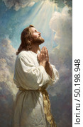 A man in a white robe is praying in front of a cloudy sky. Стоковое AI-изображение, AI-художник Ярославский Максим / Фотобанк Лори