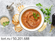 Eggplant hummus with ingredients for cooking. Traditional vegan arabic aubergine appetizer. Baba Ghanoush. Стоковое фото, агентство Ingram Publishing / Фотобанк Лори