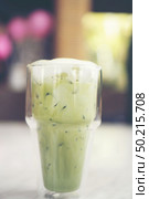 Cool green tea with whipped cream. Стоковое фото, агентство Ingram Publishing / Фотобанк Лори