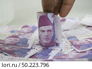 50 rupees Pakistani currency note. Стоковое фото, агентство Ingram Publishing / Фотобанк Лори