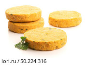 Raw veggie burgers with chickpeas and vegetables with parsley leaves on white background. Стоковое фото, агентство Ingram Publishing / Фотобанк Лори