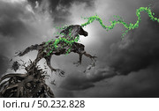 Concept of power and motivation as a surreal horse made of roots breaking free as an enironmental hope symbol in a 3D illustration style. Стоковое фото, агентство Ingram Publishing / Фотобанк Лори