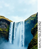 Water flows powerfully over dark rocks, plunging into a serene pool below. Surrounding hills are lush and green, creating a stunning natural backdrop under a cloudy sky Generative AI. Стоковое AI-изображение, AI-художник Юлия Петровская / Фотобанк Лори