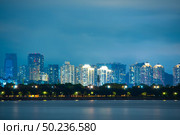 Shenzhen city skyline night scenery, China. Стоковое фото, агентство Ingram Publishing / Фотобанк Лори