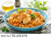 Fried cabbage, bulgur and chicken breast. Стоковое фото, агентство Ingram Publishing / Фотобанк Лори