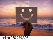 Happines cheerful perforated paper smiley face. Стоковое фото, агентство Ingram Publishing / Фотобанк Лори