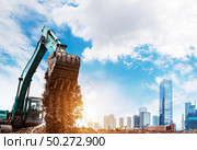 excavator in action. Стоковое фото, агентство Ingram Publishing / Фотобанк Лори