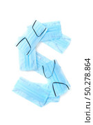 Capital letter S handmade from medical antibacterial protective blue face masks on a white background, copy space. Creative alphabet for making up new words.. Letter S made from protective medical masks on a white background. Стоковое фото, агентство Ingram Publishing / Фотобанк Лори