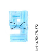 Figure 9, nine handmade from medical antibacterial protective blue face masks on a white background, copy space. Creative typeface for making up new numerical information.. Number nine made from protective medical masks on a white background. Стоковое фото, агентство Ingram Publishing / Фотобанк Лори
