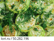 Fried zucchinis Sliced with dill and garlic. Стоковое фото, фотограф Марина Демидюк / Фотобанк Лори