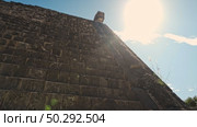 Chichen Itza Pyramid Kukulcan Stone Stairs Looking Up Sun Flare. Стоковое видео, видеограф Поскребышев Михаил / Фотобанк Лори