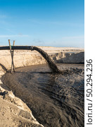 Sediment transposition intervention to the Atlantic Ocean to optimize the hydrodynamic balance in Ovar, Portugal. Стоковое фото, агентство Ingram Publishing / Фотобанк Лори