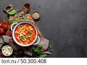 Cooking pasta e fagioli soup with chicken meat and vegetables, italian cuisine. Стоковое фото, агентство Ingram Publishing / Фотобанк Лори