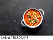 Cooking pasta e fagioli soup with chicken meat and vegetables, italian cuisine. Стоковое фото, агентство Ingram Publishing / Фотобанк Лори