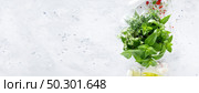 Bunch of aromatic herbs in mortar on kitchen table. Banner. Стоковое фото, агентство Ingram Publishing / Фотобанк Лори