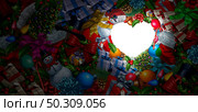 Christmas season love and winter season celebration or New Year symbol as xmas decorations shaped as a heart with copy space as a 3D render. Стоковое фото, агентство Ingram Publishing / Фотобанк Лори