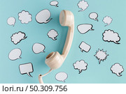 chat bubbles with telephone receiver. Стоковое фото, агентство Ingram Publishing / Фотобанк Лори