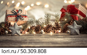 Composition with Christmas decorations in the interior. Стоковое фото, агентство Ingram Publishing / Фотобанк Лори