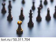 Chess pieces board game in business success leadership concept. Стоковое фото, агентство Ingram Publishing / Фотобанк Лори