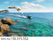 Boat in adriatic sea and Nicholas Island. Boat in adriatic sea. Стоковое фото, агентство Ingram Publishing / Фотобанк Лори