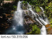 Beautiful waterfall in Frivela Portugal. Long exposure smooth effect. Стоковое фото, агентство Ingram Publishing / Фотобанк Лори