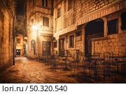 Street cafe in Old Town of Kotor at night. Стоковое фото, агентство Ingram Publishing / Фотобанк Лори