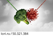 Health food and Disease fighting foods nutrition concept with a healthy broccoli vegetable destroying a virus cell as a healthcare metaphor for a fit lifestyle to attack illness with 3D illustration elements. Стоковое фото, агентство Ingram Publishing / Фотобанк Лори