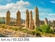 Love valley in Goreme national park. Cappadocia, Turkey. The rocks of the valley of love. Стоковое фото, агентство Ingram Publishing / Фотобанк Лори